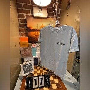 American flag graphic made of fishing lures and rods with the brand name Fripp